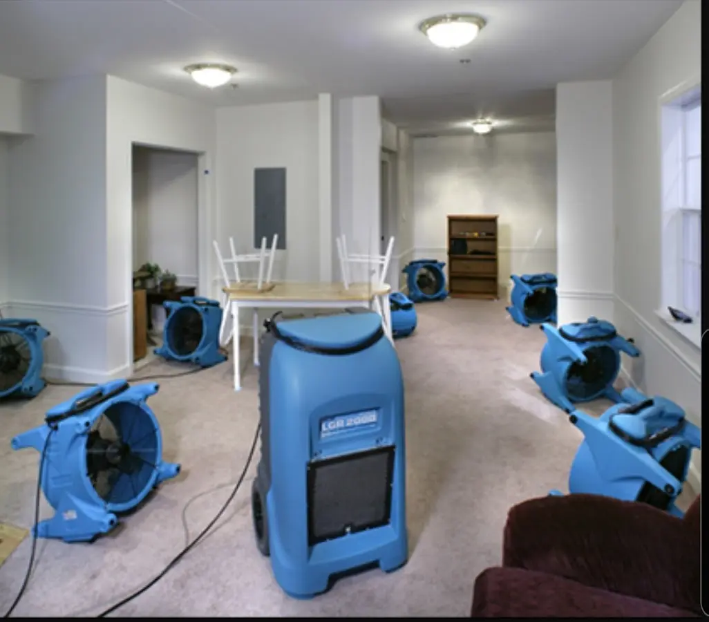 Air movers and dehumidifier setup for Water Extraction & Removal in Montebello